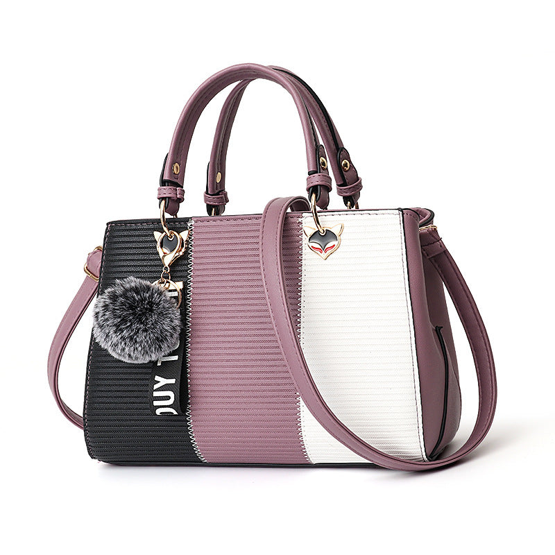 Colour-block handbag with pompom charm