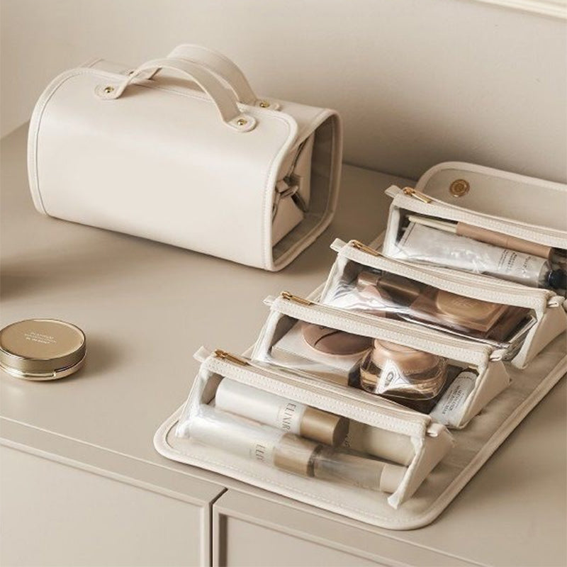 Foldable travel toiletry bag with clear pouches