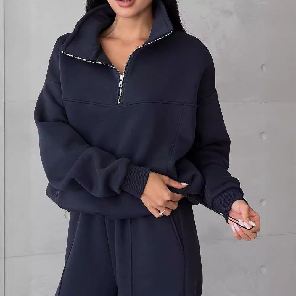 Woman in a fleece half-zip tracksuit