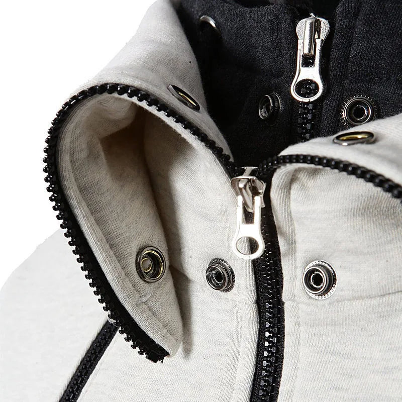 Man in a slim grey zip-up hoodie jacket