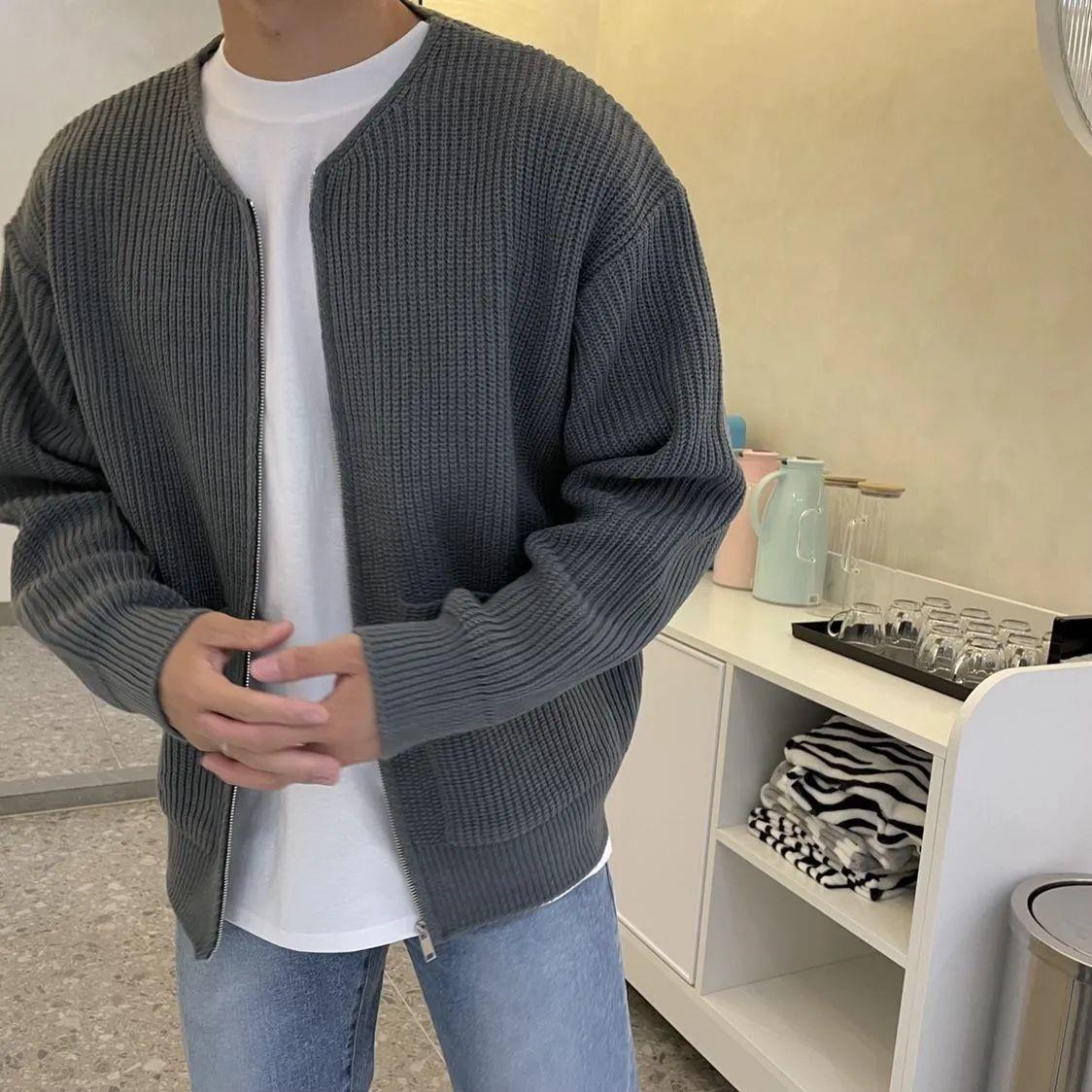 Man wearing a chunky rib knit zip cardigan