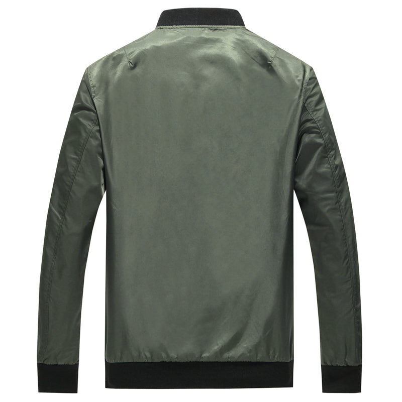 Man wearing a reversible bomber jacket