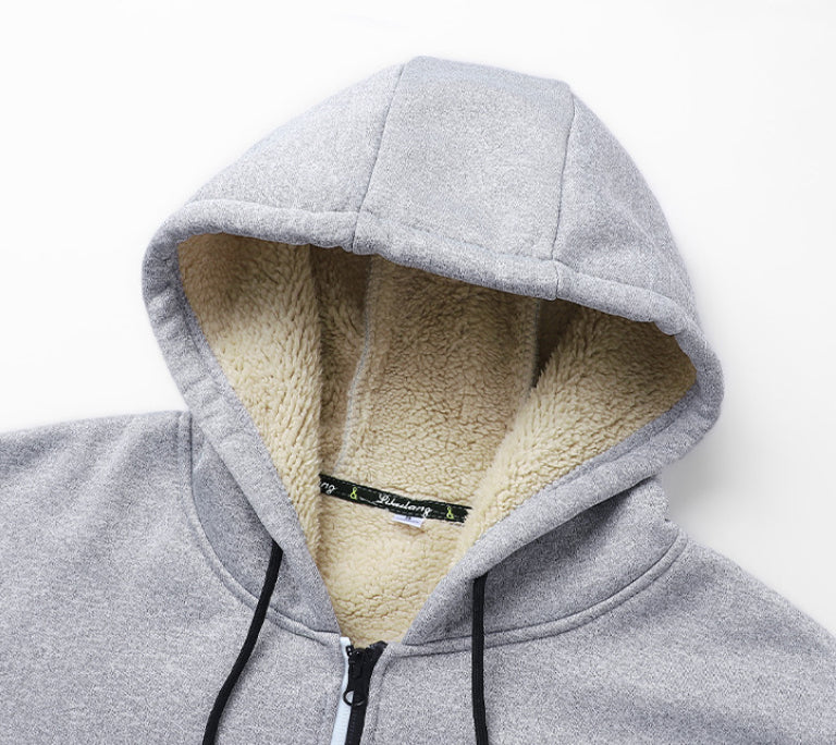 Man in a sherpa lined zip hoodie