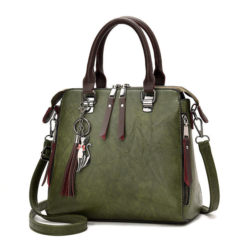 Vintage faux leather handbag with tassel