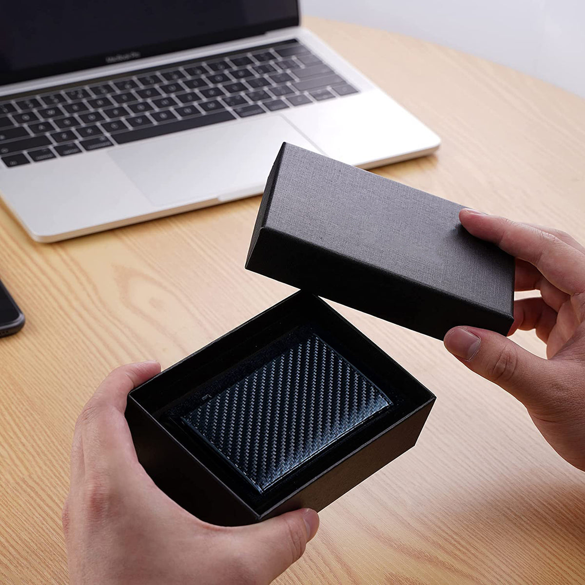 Slim pop-up card wallet with cards fanned out