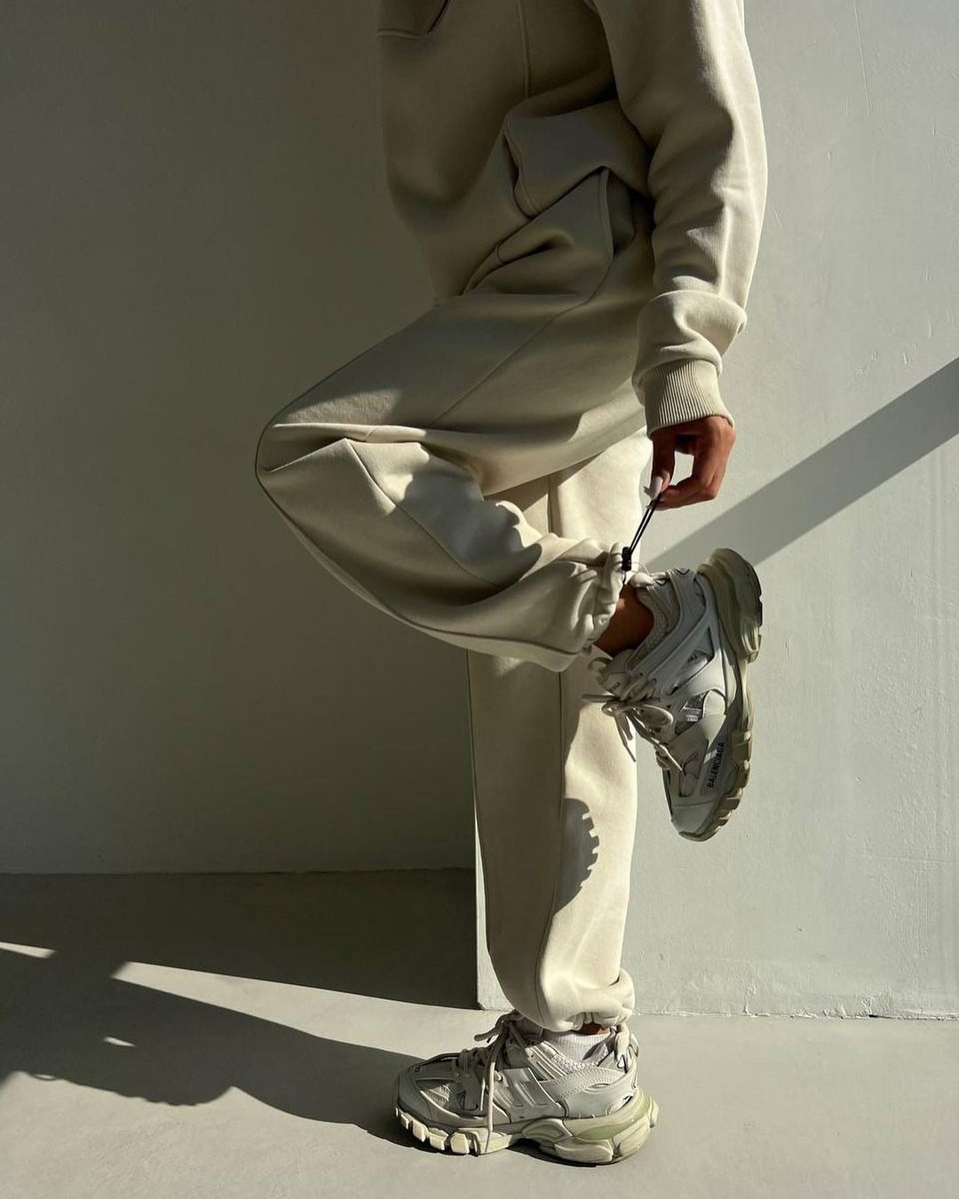 Woman in a fleece half-zip tracksuit