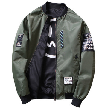 Man wearing a reversible bomber jacket