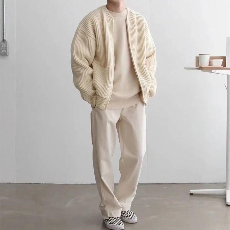 Man wearing a chunky rib knit zip cardigan