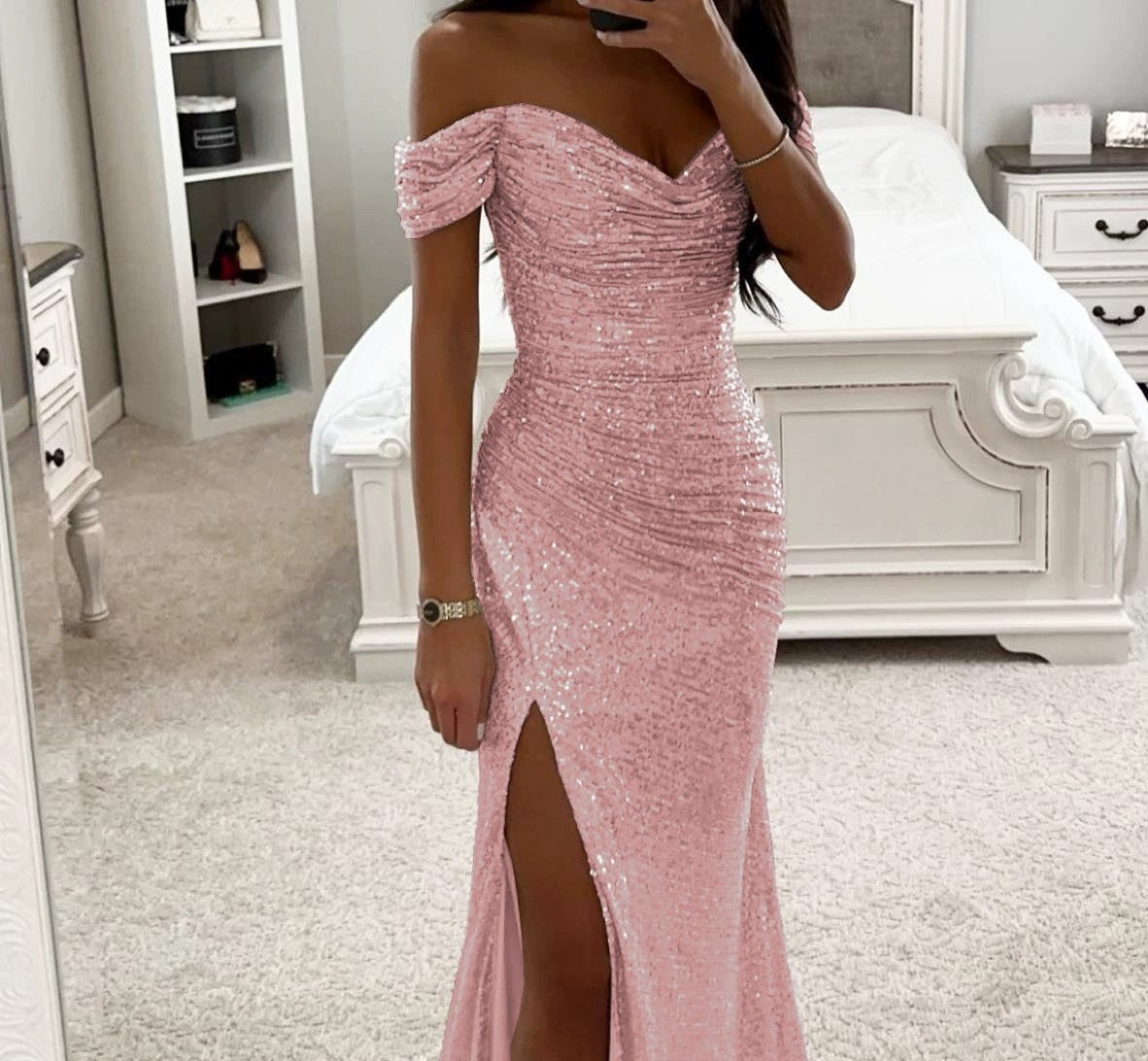 Woman in off-shoulder sequin evening gown