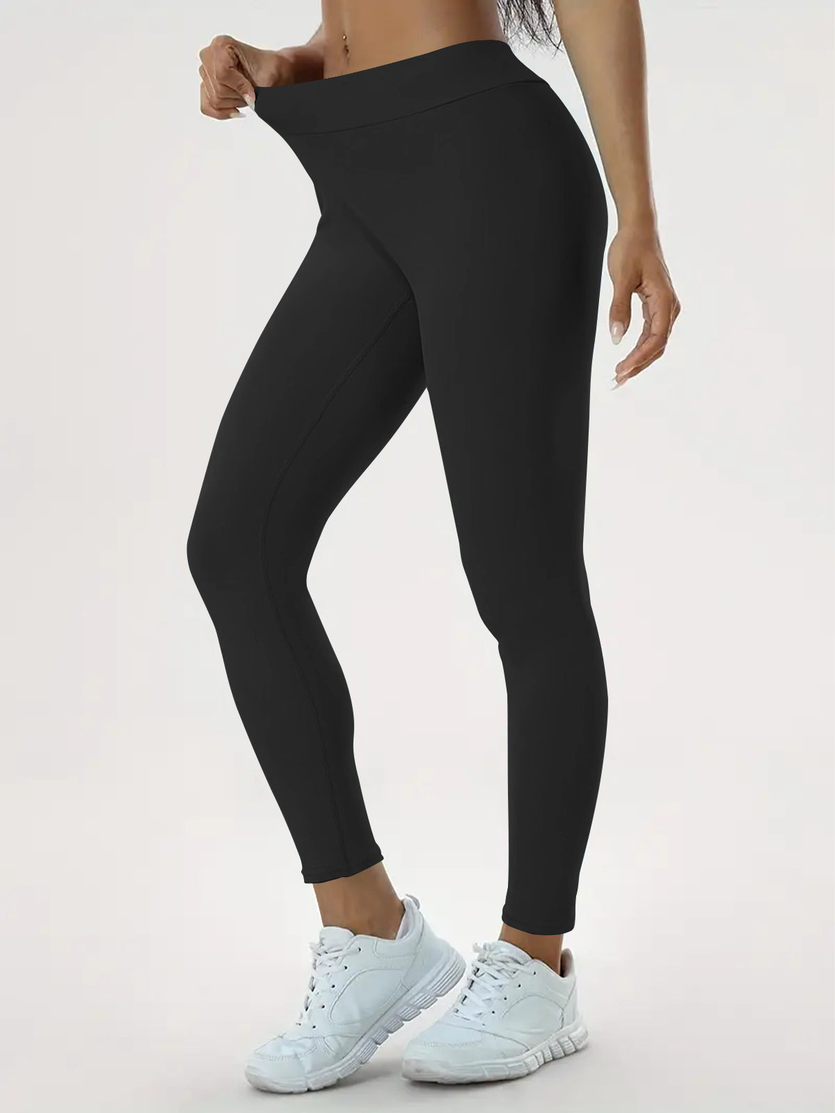 Woman in high-waisted scrunch bum leggings