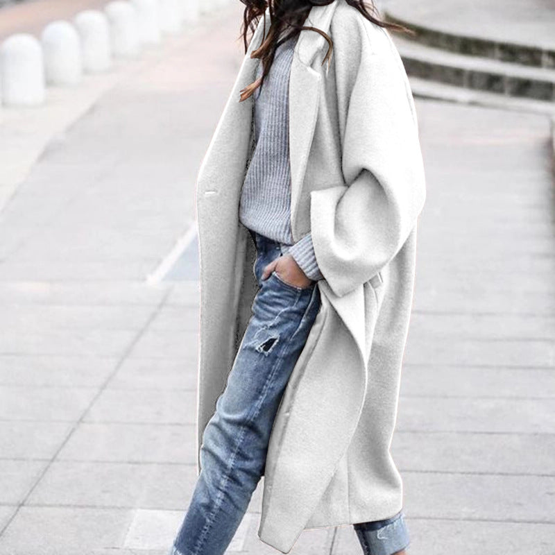 Woman wearing long oversized lapel coat