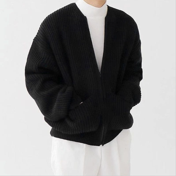 Man wearing a chunky rib knit zip cardigan