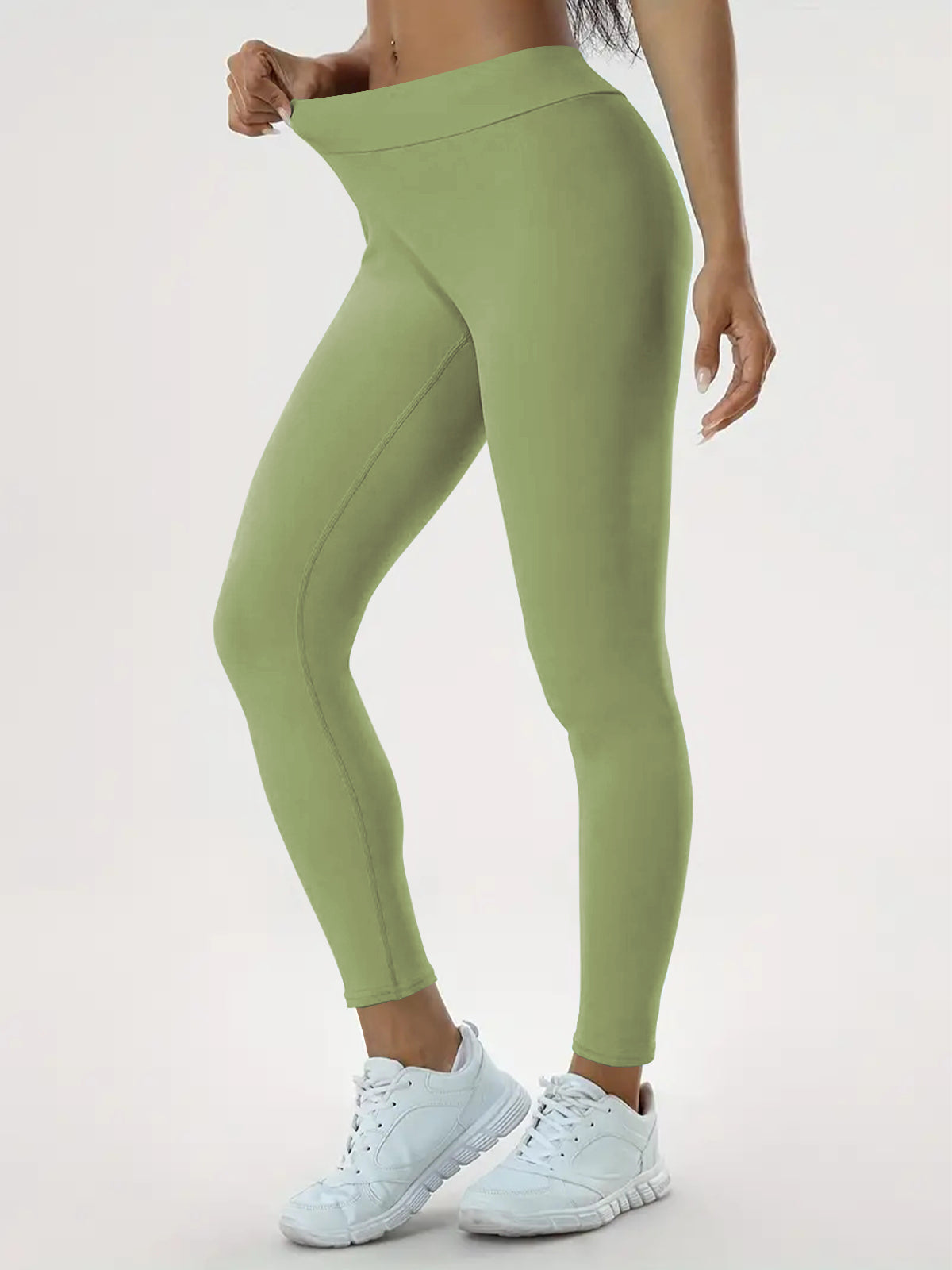 Woman in high-waisted scrunch bum leggings