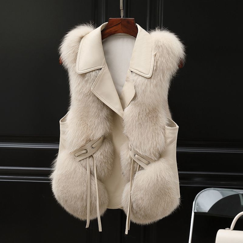 Woman in a short faux fur gilet