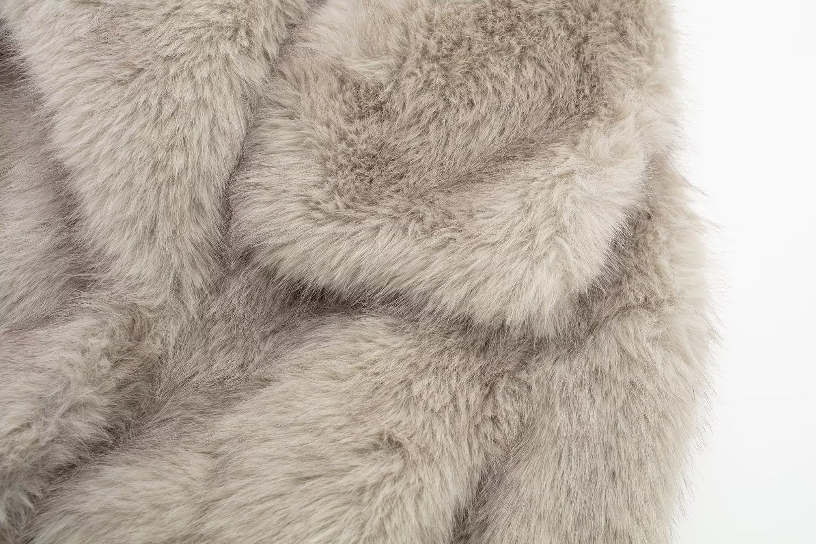 Woman in cropped fluffy faux fur jacket