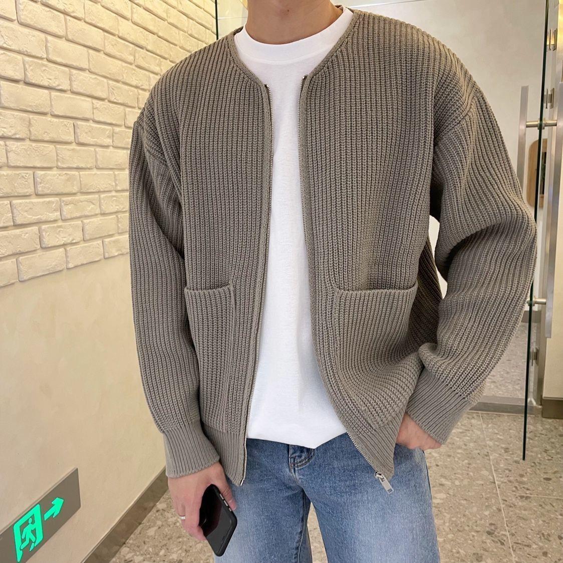Man wearing a chunky rib knit zip cardigan